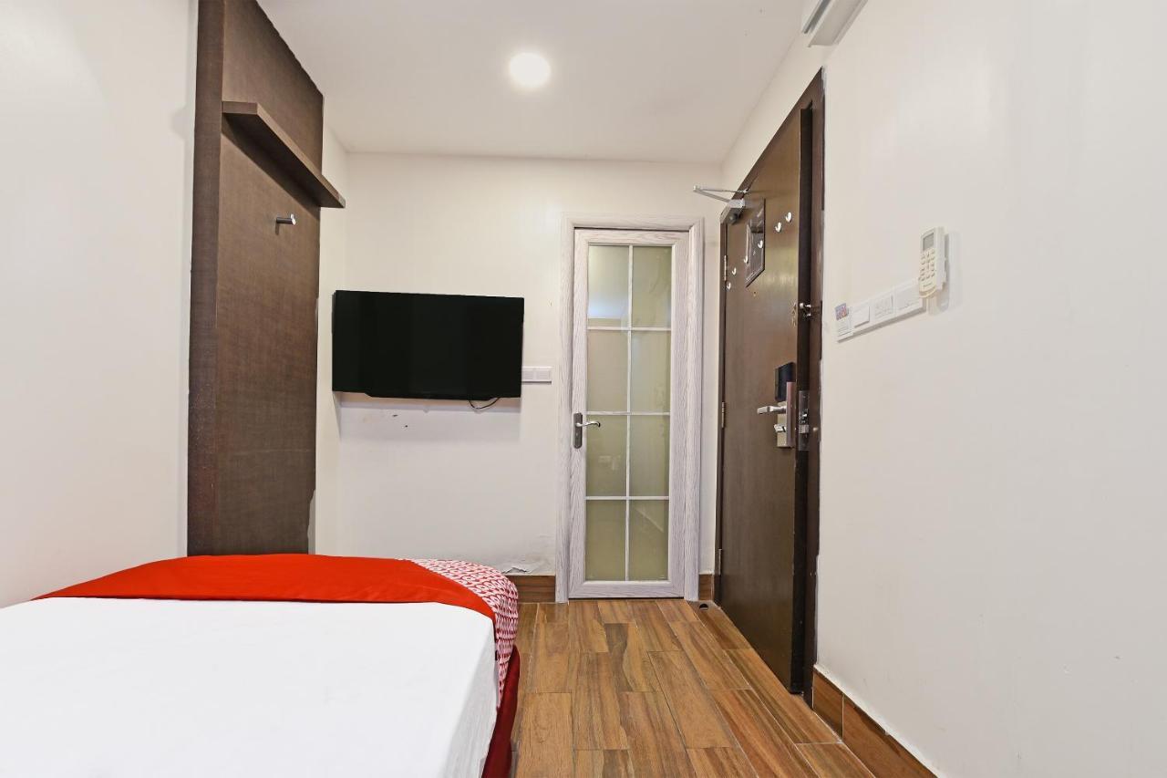 Capital O 90574 Glo Hotel