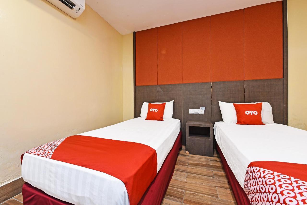Capital O 90574 Glo Hotel
